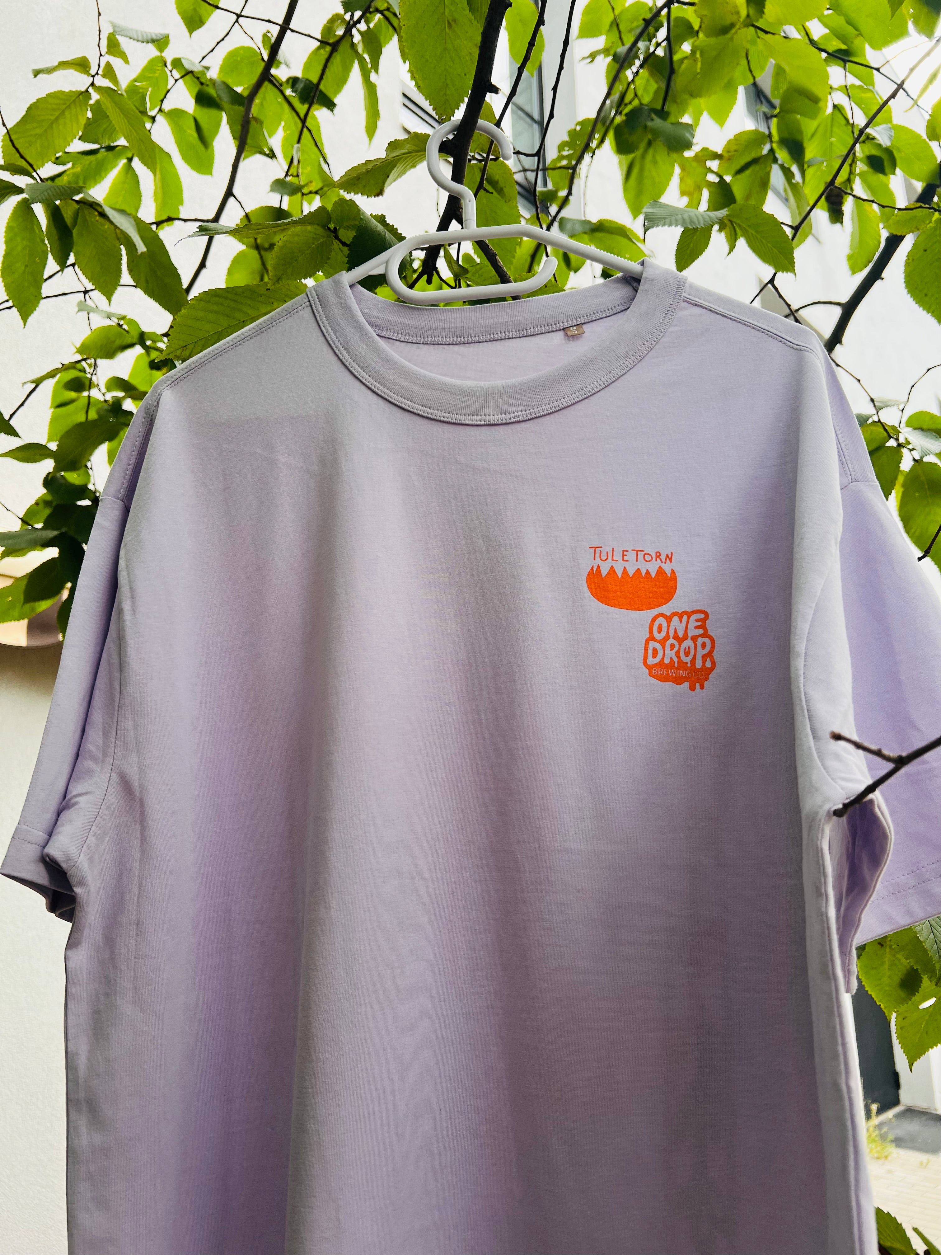 Tuletorn Pavlova Pesakond tričko lilac oranžový potisk